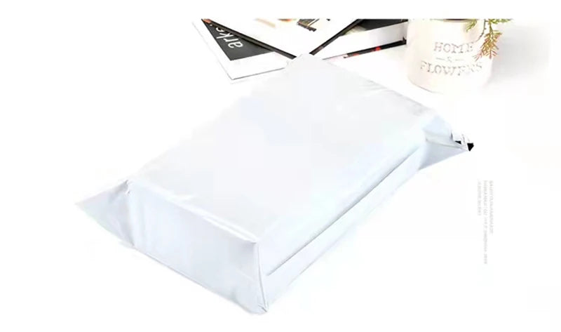 Sacchetti per buste di spedizione sacchetto di immagazzinaggio per buste Express in plastica sacchetti postali di colore bianco grigio sacchetto per corriere con sigillo autoadesivo