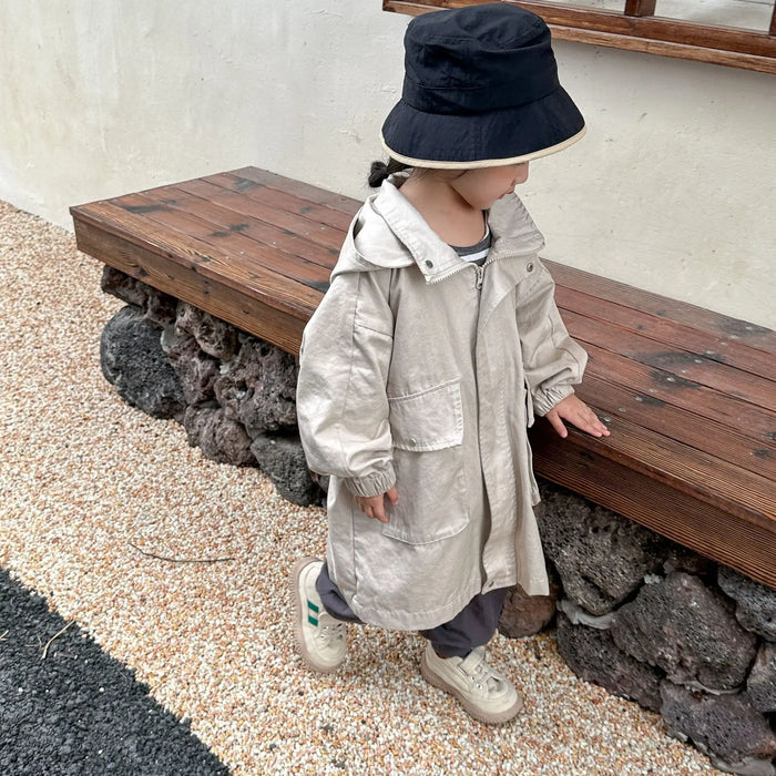 Cappotto a vento con cappuccio di media lunghezza in tinta unita per ragazzi e ragazze primaverili Trench casual con cerniera allentata per bambini