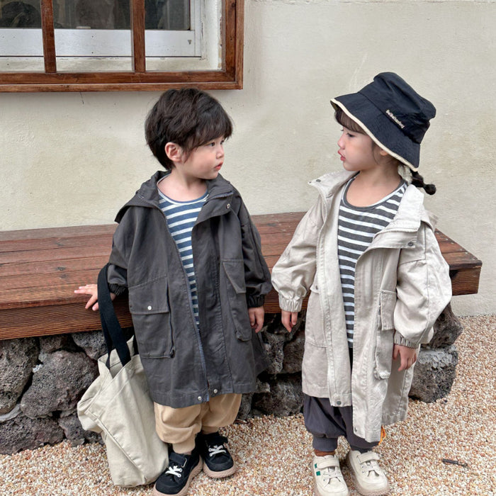 Cappotto a vento con cappuccio di media lunghezza in tinta unita per ragazzi e ragazze primaverili Trench casual con cerniera allentata per bambini