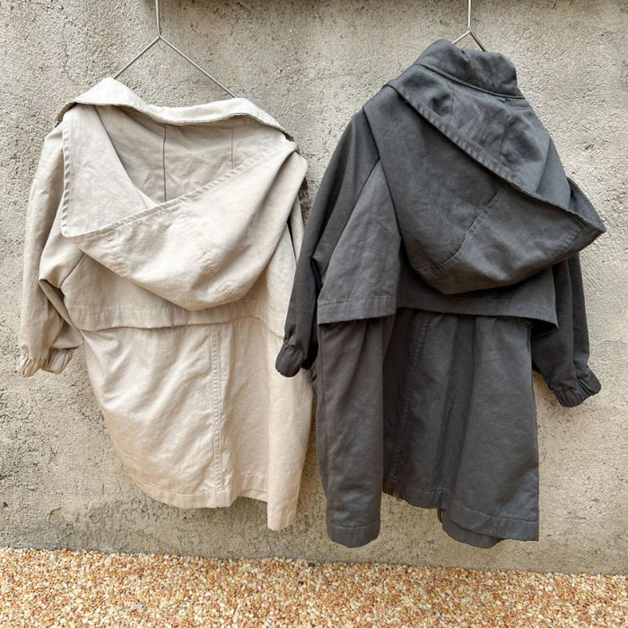 Cappotto a vento con cappuccio di media lunghezza in tinta unita per ragazzi e ragazze primaverili Trench casual con cerniera allentata per bambini