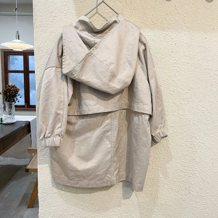 Cappotto a vento con cappuccio di media lunghezza in tinta unita per ragazzi e ragazze primaverili Trench casual con cerniera allentata per bambini