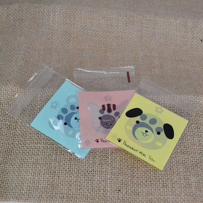 50 pz/lotto Chiaro del Cane Del Gatto Orso Caramella Sacchetto Del Regalo Del Biscotto Self-adesivo SACCHETTO di Plastica DEL OPP Per La Cerimonia Nuziale Di Compleanno Del Partito Dei Monili favori 8z