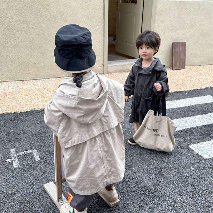 Cappotto a vento con cappuccio di media lunghezza in tinta unita per ragazzi e ragazze primaverili Trench casual con cerniera allentata per bambini