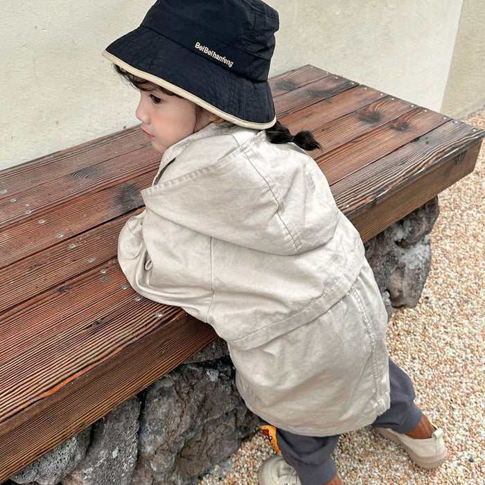 Cappotto a vento con cappuccio di media lunghezza in tinta unita per ragazzi e ragazze primaverili Trench casual con cerniera allentata per bambini