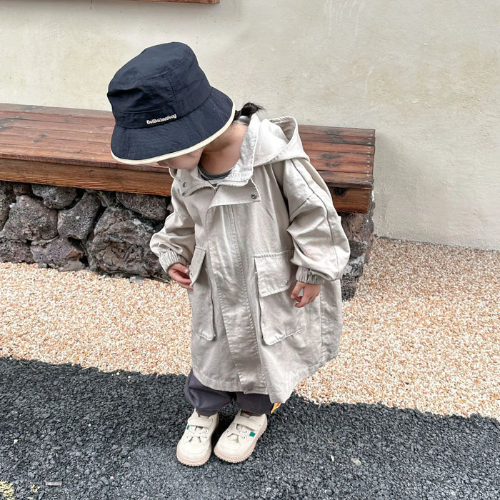 Cappotto a vento con cappuccio di media lunghezza in tinta unita per ragazzi e ragazze primaverili Trench casual con cerniera allentata per bambini