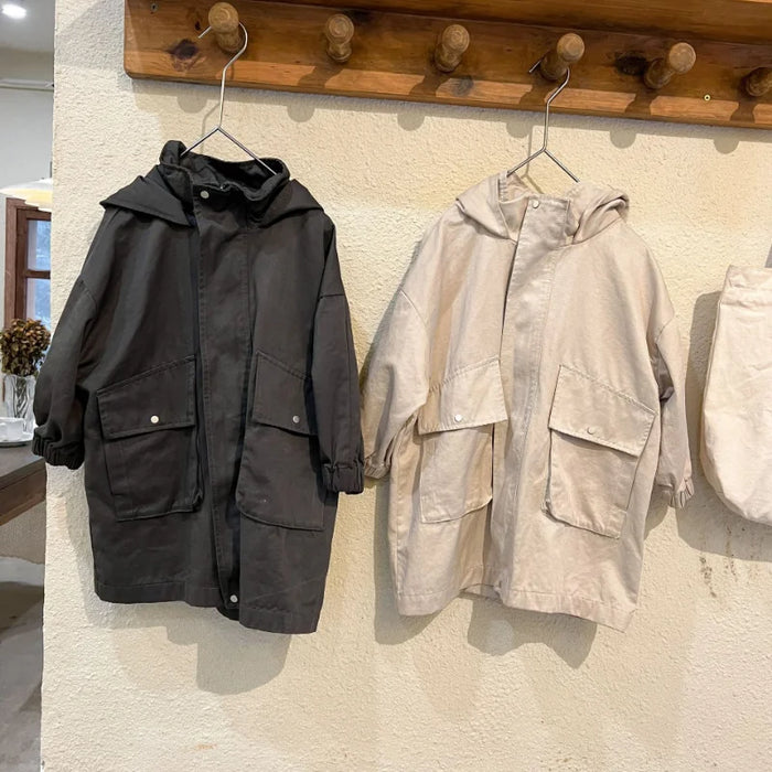 Cappotto a vento con cappuccio di media lunghezza in tinta unita per ragazzi e ragazze primaverili Trench casual con cerniera allentata per bambini