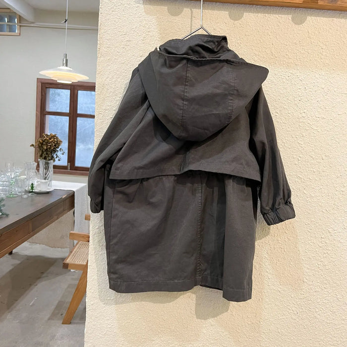 Cappotto a vento con cappuccio di media lunghezza in tinta unita per ragazzi e ragazze primaverili Trench casual con cerniera allentata per bambini