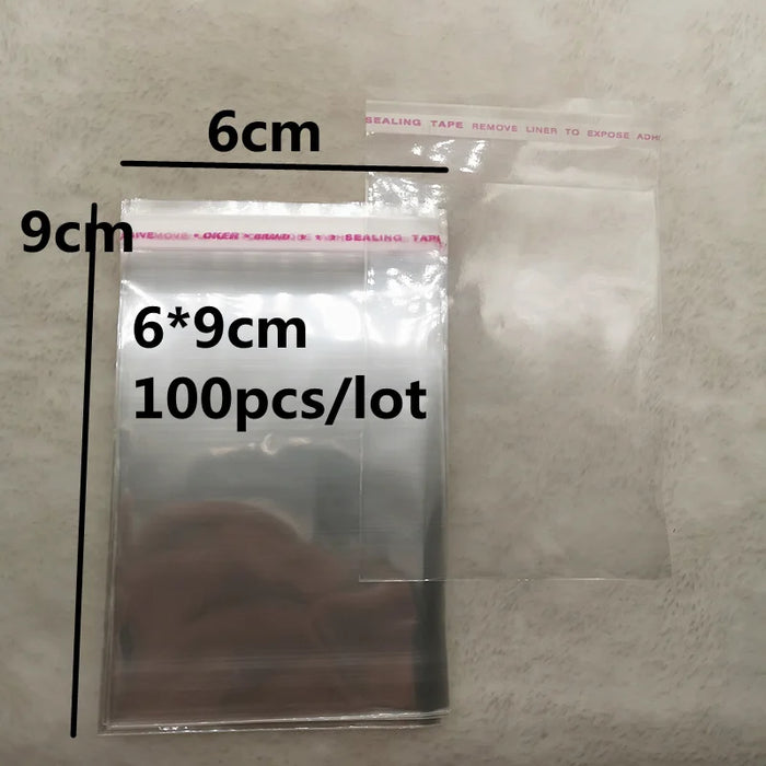 100pcs 6x9cm Richiudibile Poli Sacchetto Trasparente Sacchetto Del Opp Sacchetti di Plastica Autoadesiva Seal Fare Dei Monili del Sacchetto